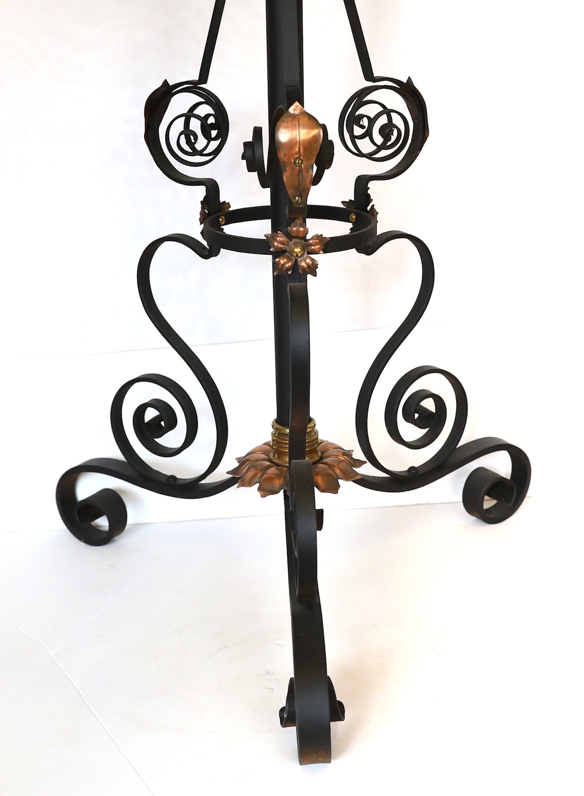 A late Victorian wrought iron brass and copper telescopic oil lamp standard with etched glass shade and flue, height overall 159cm